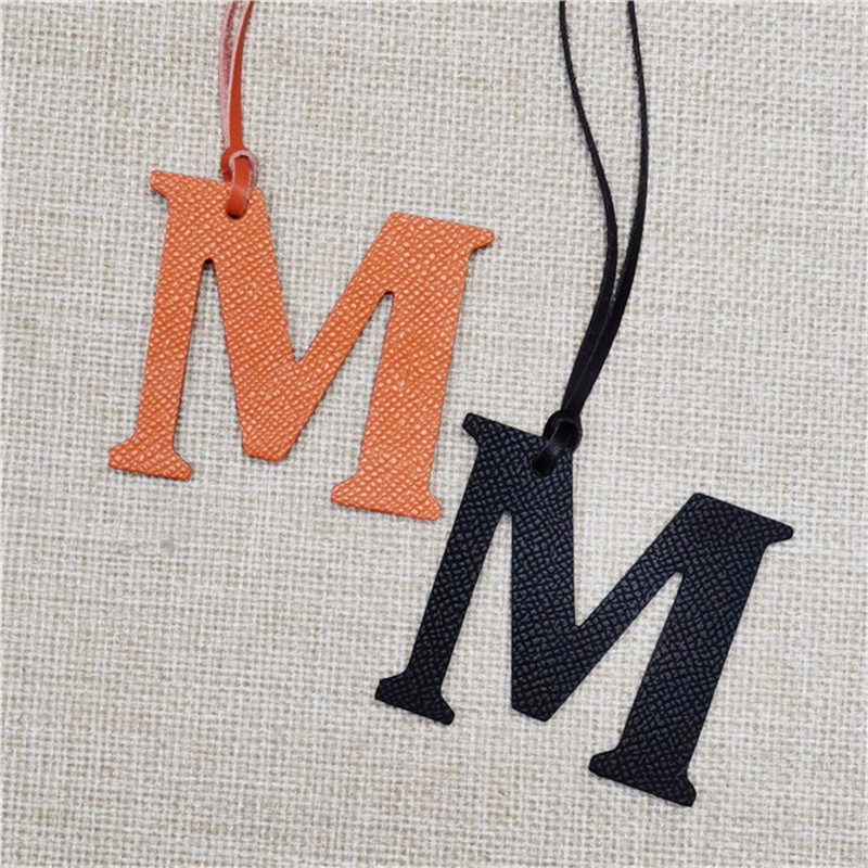 XMESSUN New English Letters M  - đánh giá và giá Monogram Keychain Leather